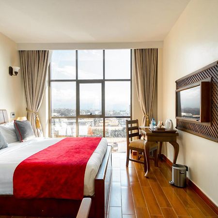 Kibo Palace Hotel Моши Стая снимка
