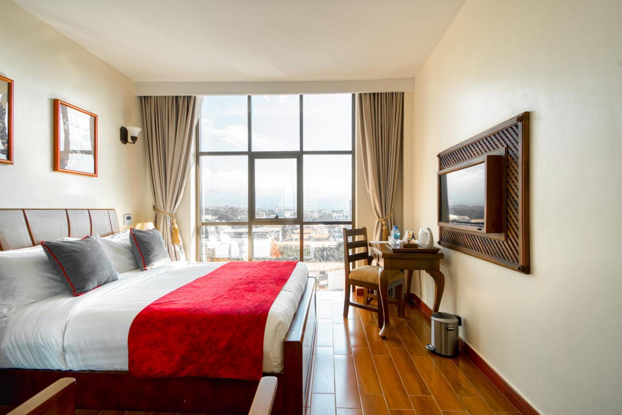 Kibo Palace Hotel Моши Стая снимка